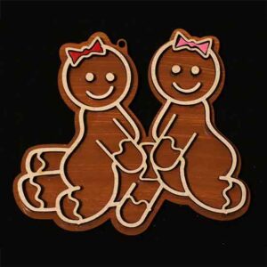 three gingerbread cookies having a threesome