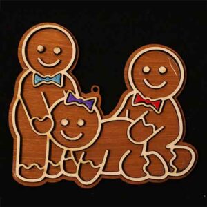 three gingerbread cookies having a threesome