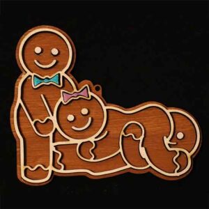 three gingerbread cookies having a threesome