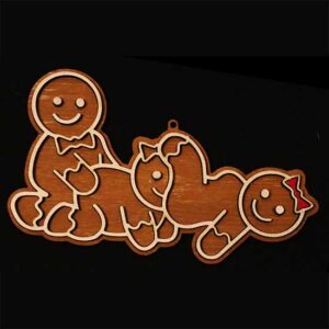 three gingerbread cookies having a threesome